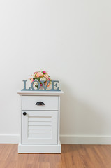 Love sign on bedside table