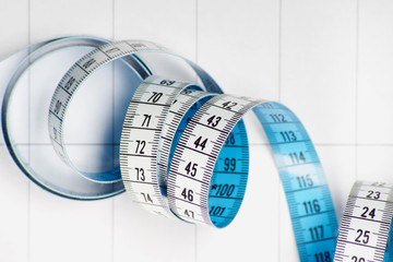 Clipboard and measuring tape