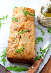Bread with cheese and dill, decorated with arugula.