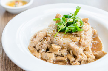 Chicken with brown sauce on rice