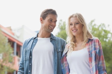 Fototapeta premium Hip young couple smiling and standing