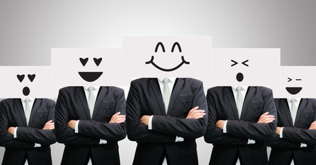 Businessman standing white paper happy smile face holding front