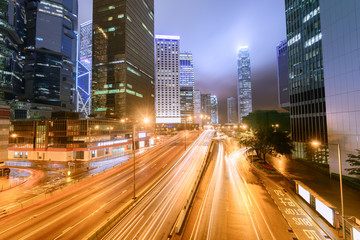 traffic with blur light through city at night