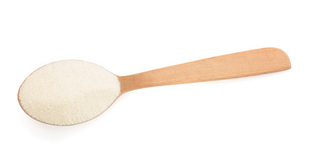 semolina in spoon on white