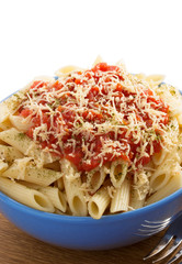 pasta Penne in plate on white background