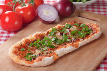 Plain pizza with tomato sauce and herbs