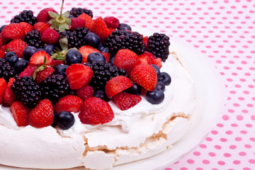 pavlova cake with berry fruits
