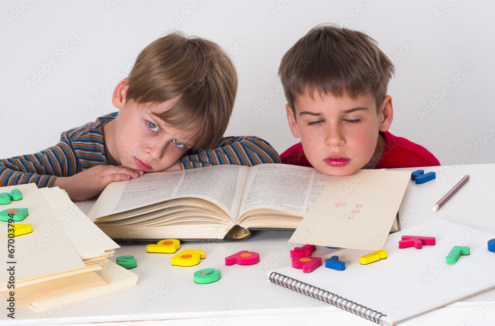 Wall mural bored children trying to learn