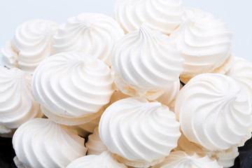 French vanilla meringue cookies on white background