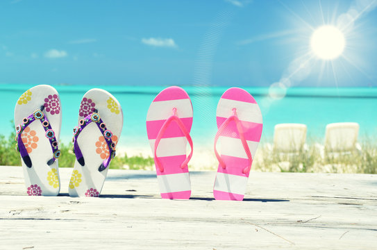 Flip-flops against ocean. Exuma, Bahamas