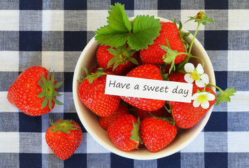 Have a sweet day with bowl of fresh strawberries