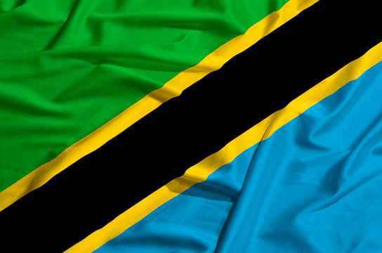 Tanzania flag on a silk drape waving