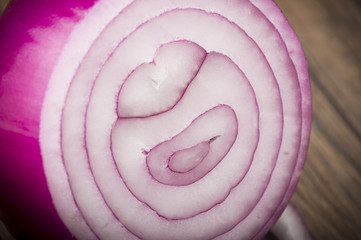 Red Onion rings close up on the  table