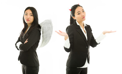 Angry angel side and devil side of a young Asian businesswoman