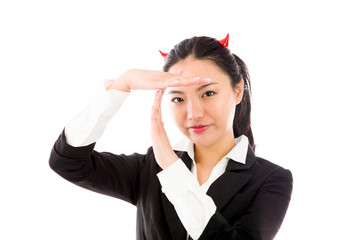 Devil side of a young Asian businesswoman making time out signal