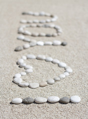 Fototapeta na wymiar I love you message composed from beach pebbles