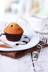 Blueberry muffin with chocolate sauce