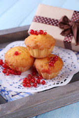 Tasty muffin with red currant berries