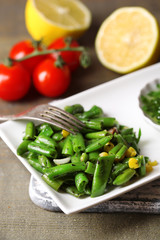 Salad with green beans and corn, and sauce