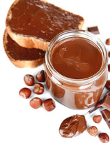 Sweet chocolate cream in jar isolated on white