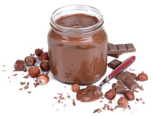 Sweet chocolate cream in jar isolated on white