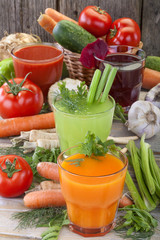 Healthy vegetable juices of carrot, celery, beetroot and tomato