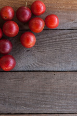 Plums on a wooden board
