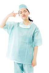 Asian female surgeon pointing finger to head