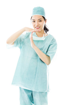 Asian Female Surgeon Showing Timeout Signal