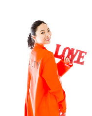 Asian young woman holding a red 