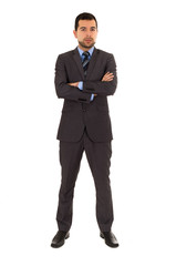 young latin man standing wearing grey suit