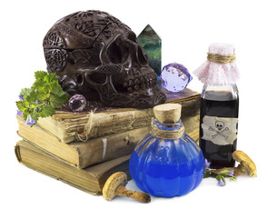 Magic still life with skull and books