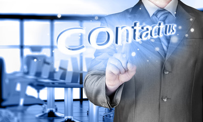 Businessman pushing CONTACT US sign