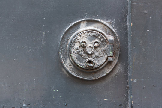 Old rusted natural gas distribution plate in Paris
