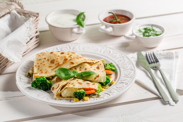 Pancake with vegetables and three sauces