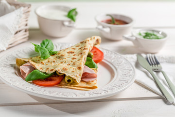 Pancake with vegetables and ham