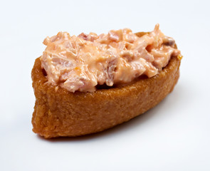 inari sushi with crab and roe tobiko