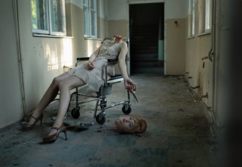 Art photo of the patient with cut head in the abandoned hospital