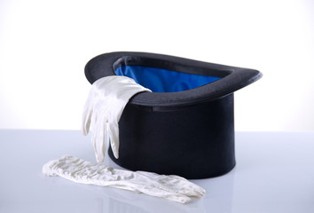 Black top hat with white gloves