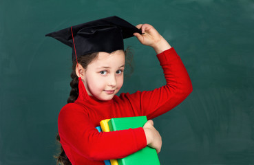 little girl with university hat