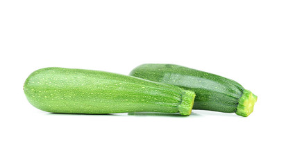 Pair of fresh green zucchini isolated on white background