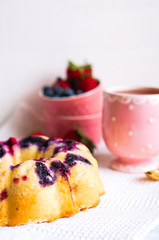 Berry cake on white background