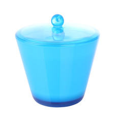 Side of blue plastic jar with cover on white background.