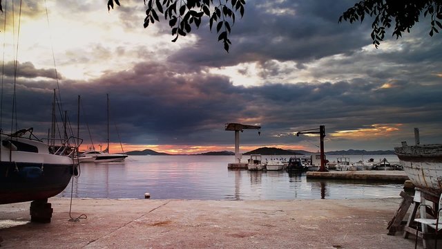 Sunset in harbor in Dalmatia, Croatia, island Zlarin time lapse