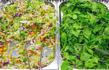 Lattuce and salad seen at a restaurant buffet