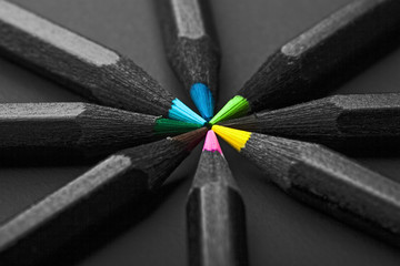black, colored pencils, on black background