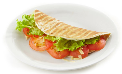 tortilla with vegetables and cheese