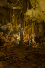 The guy survey stalagmite cave