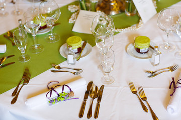 Elegant table set in lilac and green for wedding or event party
