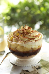 close up banana cupcake in big cup